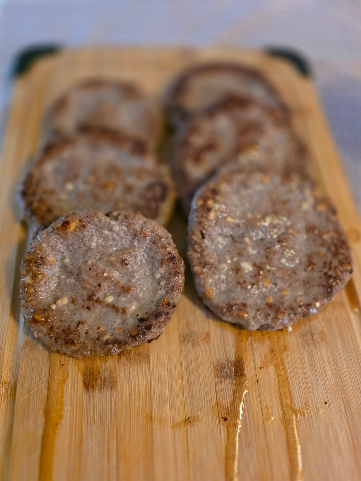GDS Burger Company — cooked burger patties on cutting board